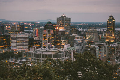 High angle view of buildings in city against sky