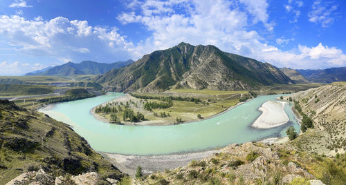 Panoramic view of katun river and mountains against sky, altai, russia