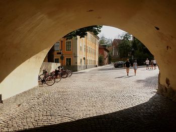 People riding bicycle on street