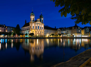 Illuminated buildings in water