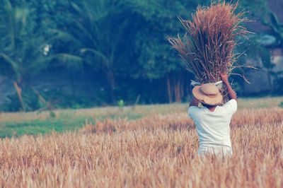 Woman working on field