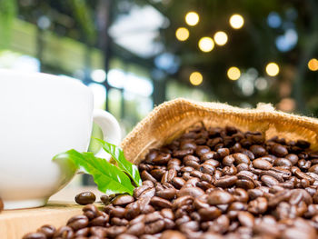 Close-up of coffee beans on table