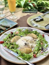 High angle view of vegetables in plate on table