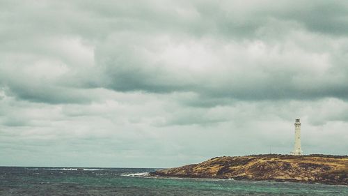 Scenic view of sea against cloudy sky