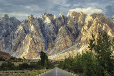 Panoramic view of road amidst mountains against sky