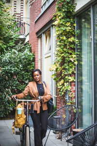 Portrait of woman riding bicycle