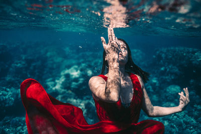 Man swimming in sea