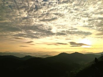 Scenic view of silhouette landscape against sky during sunset