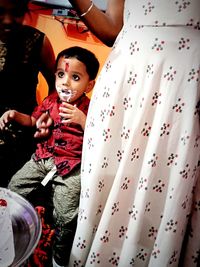 High angle view of people standing at home