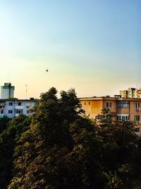 Buildings against clear sky