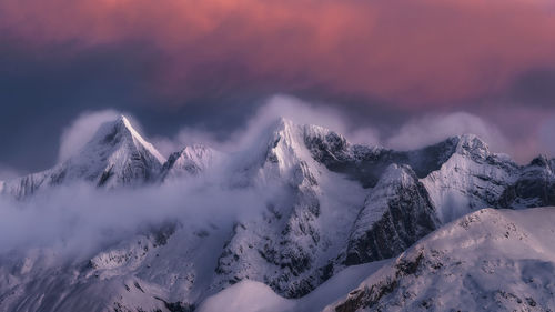 Landscape of snowy mountains covered by clouds. national park picos de europa, spain