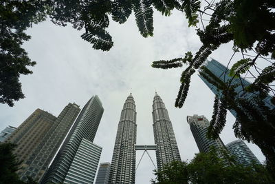 Low angle view of skyscrapers against sky