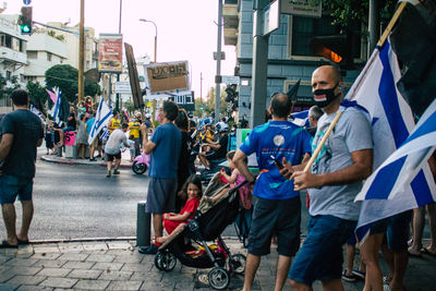 People on street in city