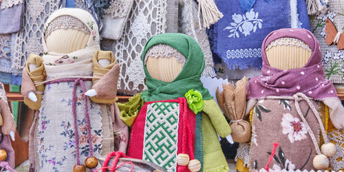 Little slavic folk rag dolls, closeup. mascots associated with heathen traditions, amulets. handmade