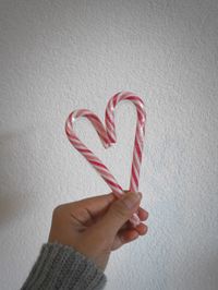 Close-up of hand holding heart shape