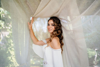 Portrait of smiling young woman