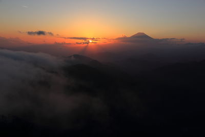 Scenic view of dramatic sky during sunset