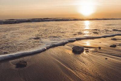 Scenic view of sea against sky during sunset
