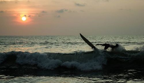 Scenic view of sea at sunset