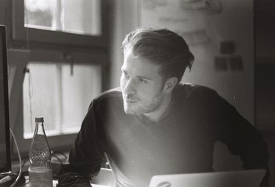 Portrait of young man in office