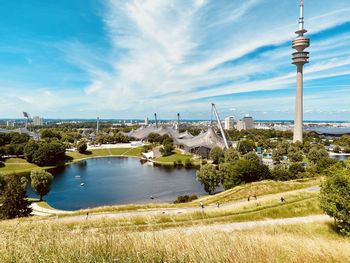 View of buildings against cloudy sky