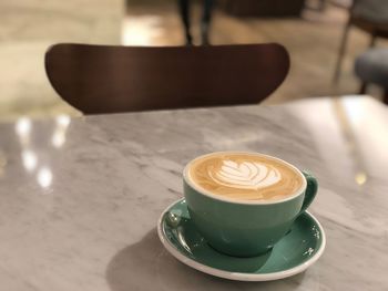 Coffee cup on table