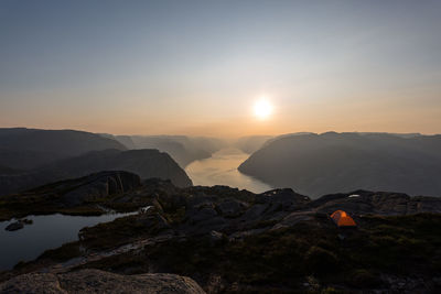 Scenic view of mountains against sky during sunset