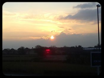 Scenic view of landscape at sunset