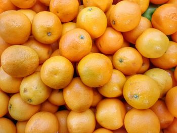 Full frame shot of oranges at market