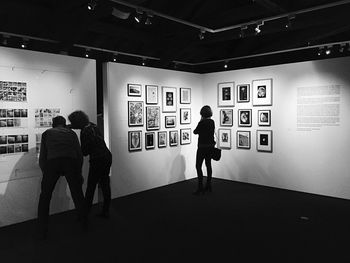 Full length of woman in dark room