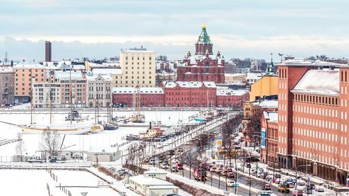 Uspenski cathedral in city against sky during winter