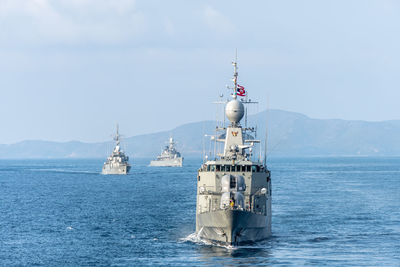 Ship in sea against sky