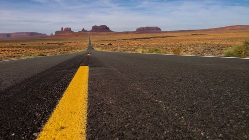 Surface level of road against the sky