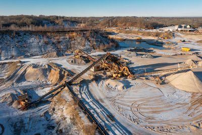 Gravel quarrying in a gravel pit during a drone flight