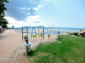 Scenic view of beach against sky