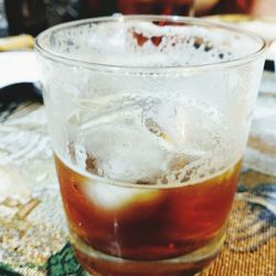 Close-up of beer glass on table