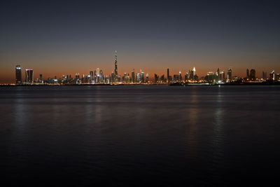 Dubai slyline from dubai creek harbour and dubai canal to downtown and business bay, uae