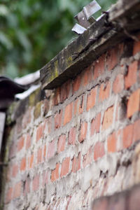 Low angle view of brick wall