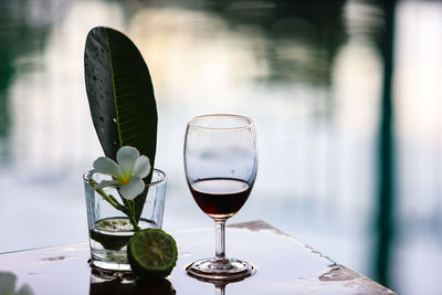 Close-up of wine glass on table