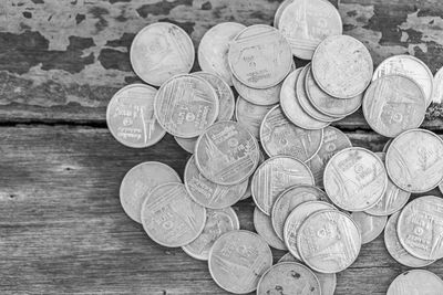 High angle view of coins on table