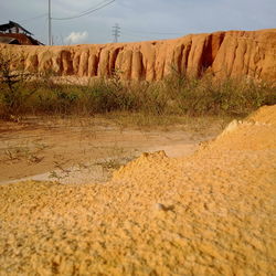 Scenic view of land against sky