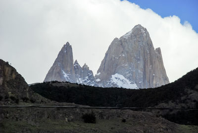 Scenic view of rocky mountains against sky