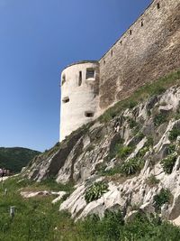 Low angle view of fort against sky