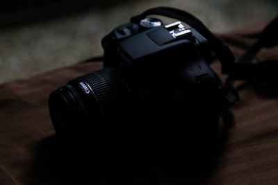 Close-up of camera on table