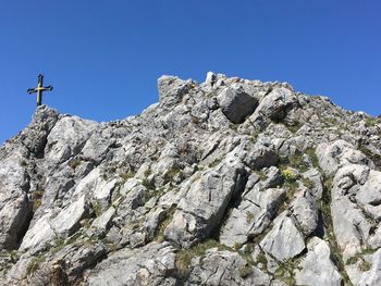 Summit cross in the bavarian alps hochfelln