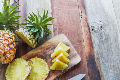 High angle view of fruits on cutting board