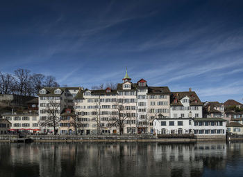 Reflection of buildings in river