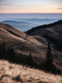 Scenic view of landscape against sky during sunset