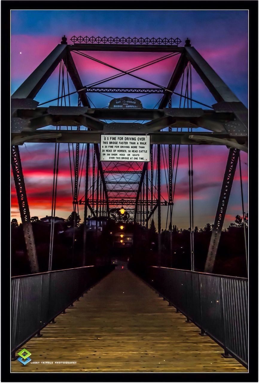 transfer print, built structure, architecture, auto post production filter, railing, illuminated, connection, bridge - man made structure, indoors, the way forward, transportation, engineering, steps, steps and staircases, low angle view, staircase, bridge, diminishing perspective, night, long