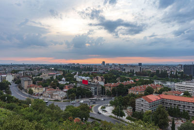 High angle view of buildings against sky at sunset